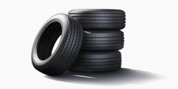 pile-of-tires-on-white-background-royalty-free-image-672151801-1561751929